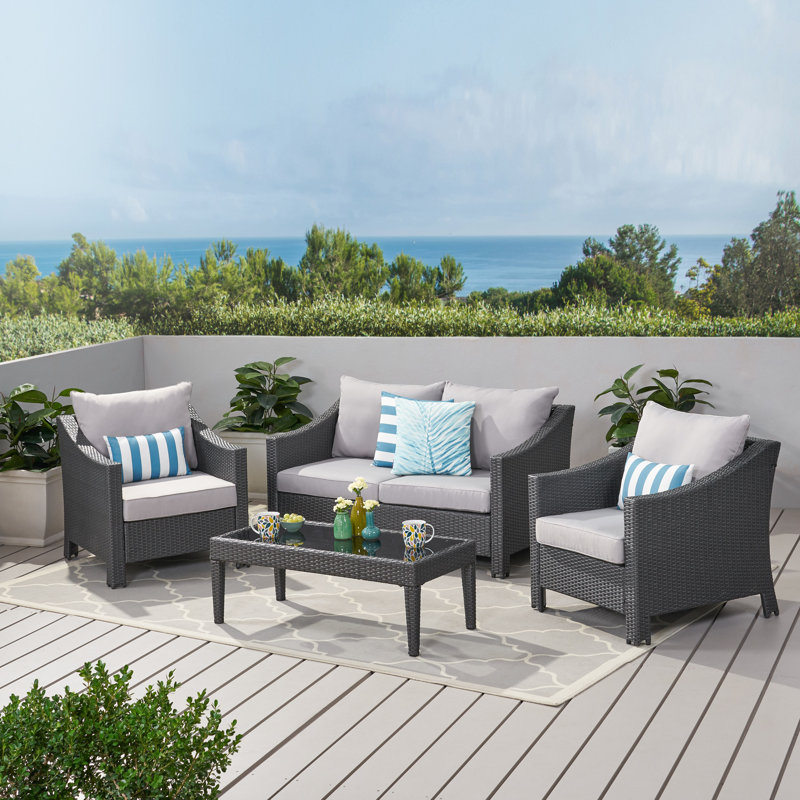 Portola 4 Piece Rattan Sectional Seating Group with Cushions & Reviews